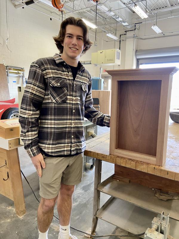 Cape High sophomore Keller Mancari won the bronze. He shows a different cabinet he made for a school project.